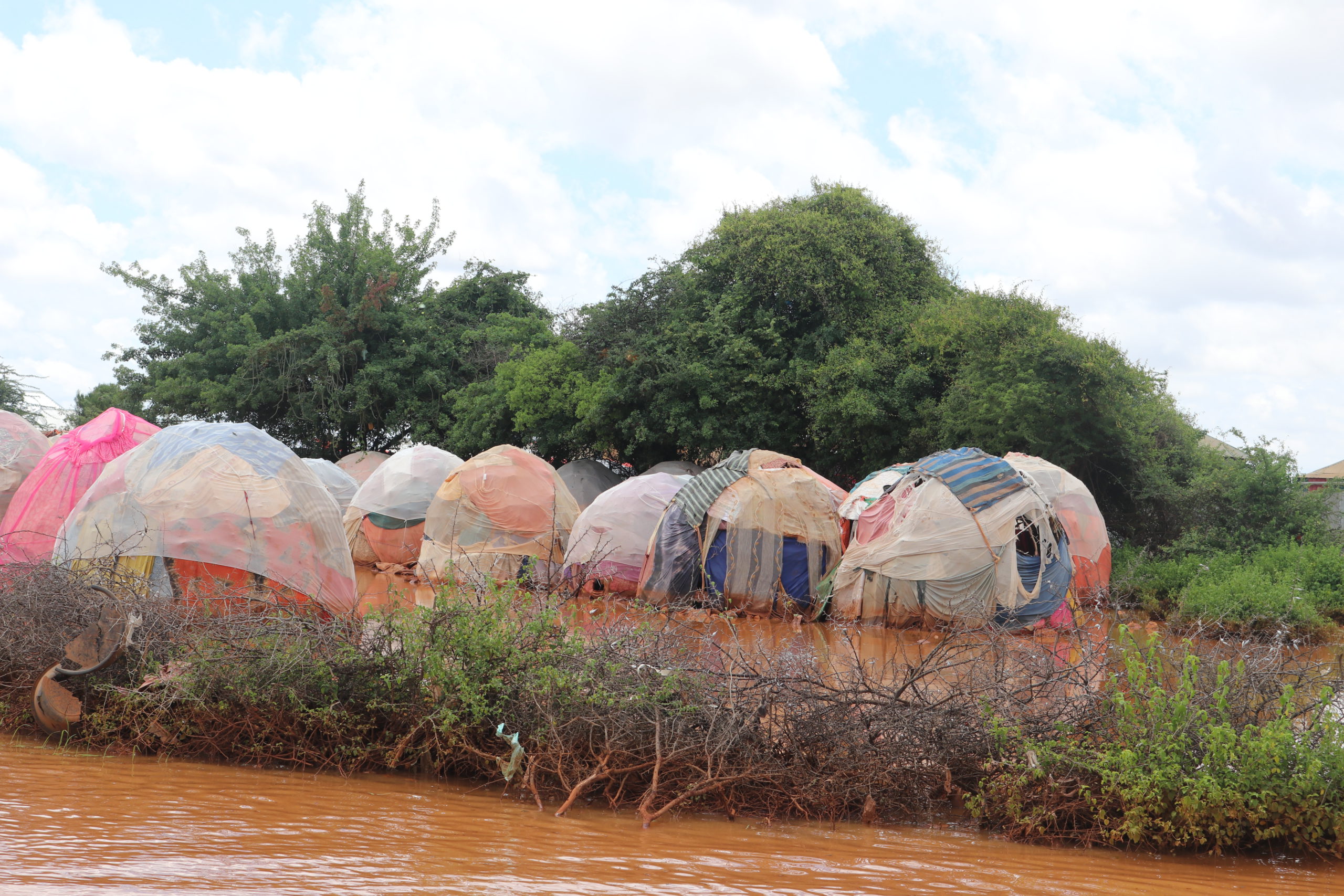 Temporary shelters surrounded by flooding in Baidoa, Somalia